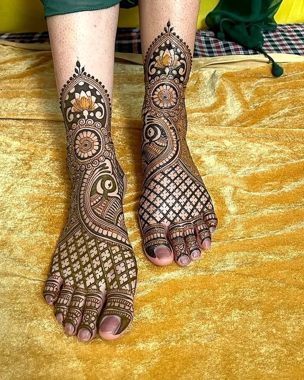 Bridal feet henna with lotus and peacock design