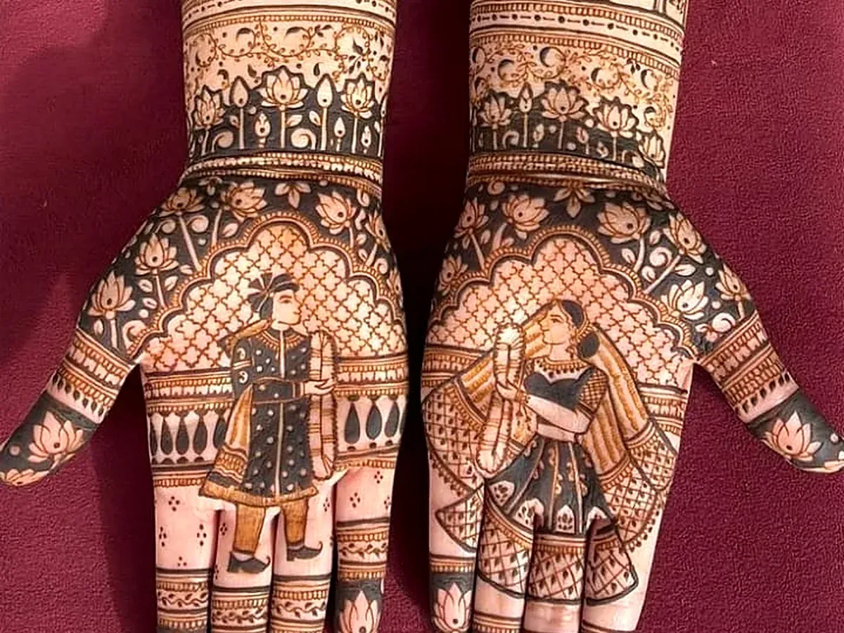 Bridal mehandi with palace, elephant and dulha dulhan figures on the palms, Chandigarh