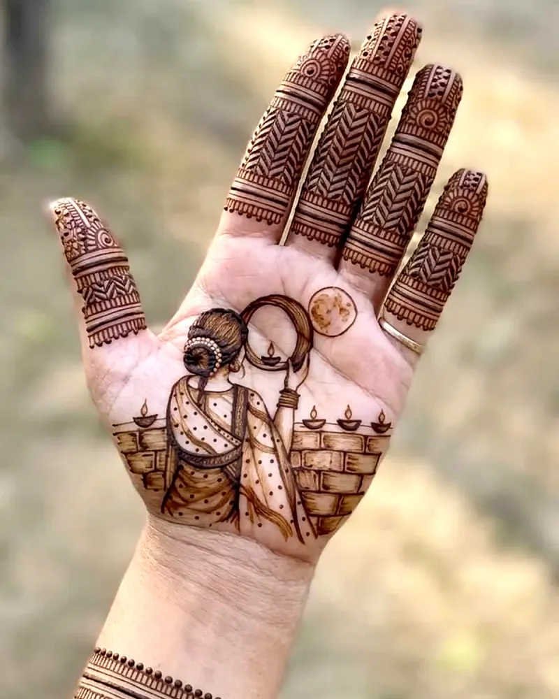 Karwa Chauth mehndi design with a woman looking at the moon through a chhalni with diyas on the palm