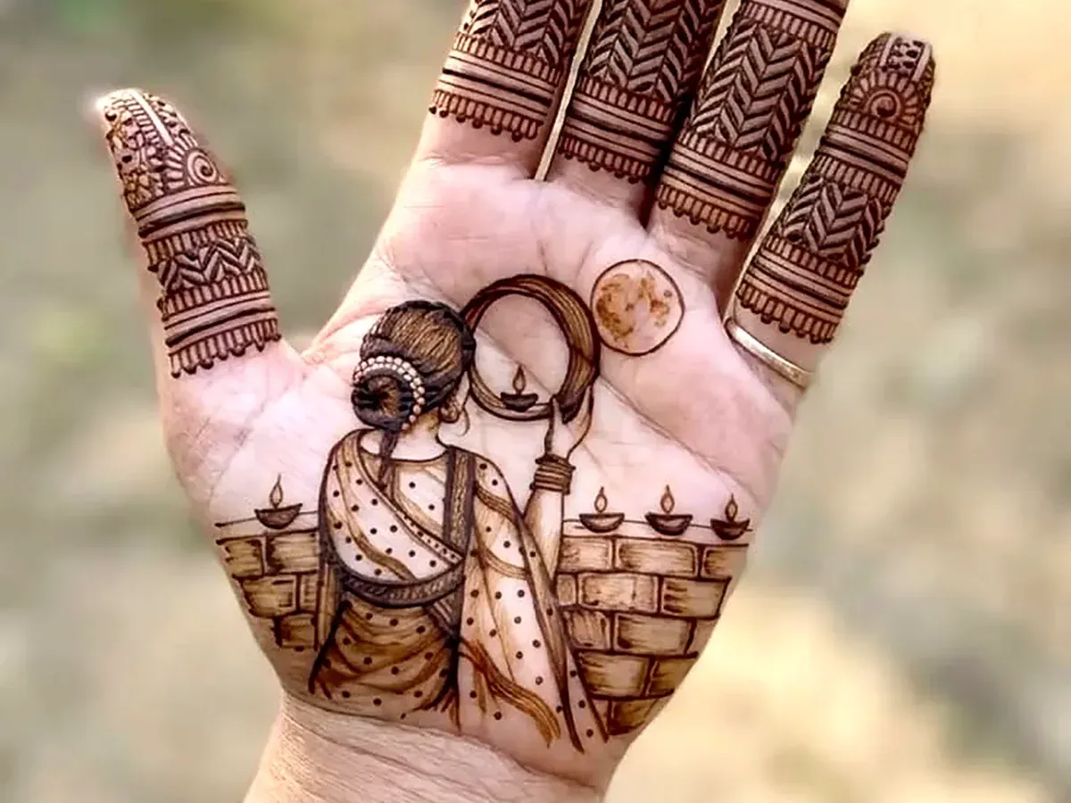 Karwa Chauth mehndi design with a woman looking at the moon through a chhalni with diyas on the palm
