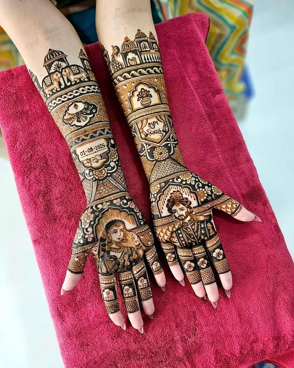 Dark maroon bridal mehndi on both palms a day after application